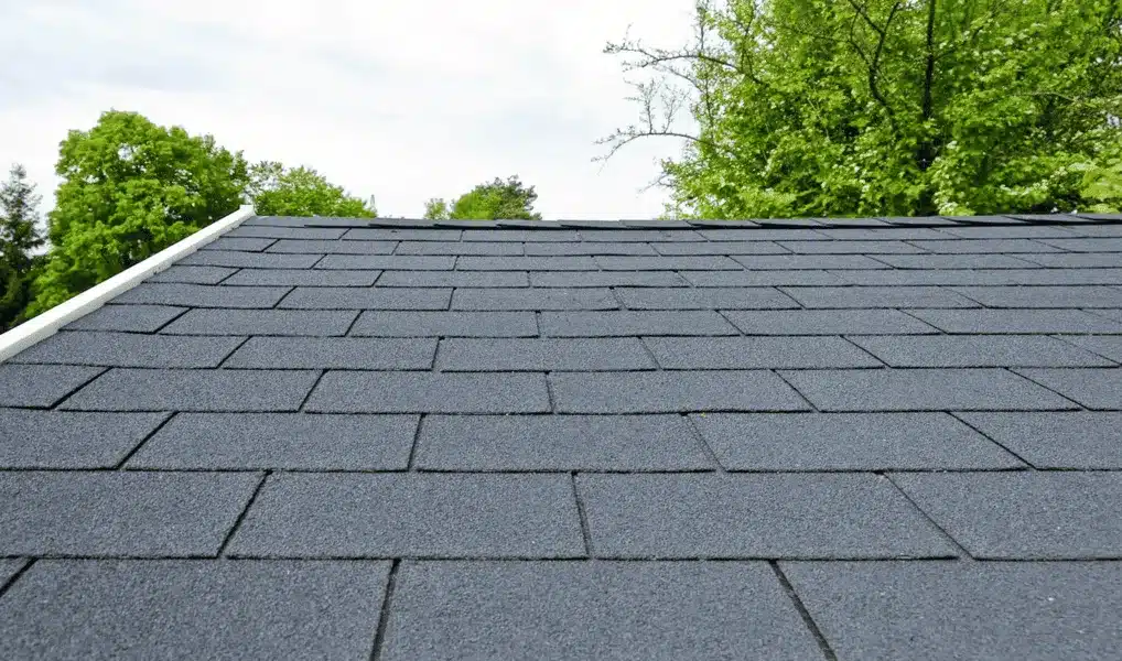 Close-up view of a roof with newly installed 3-tab asphalt shingles