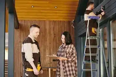 Contractor team consulting during siding project – Siding East Providence installation