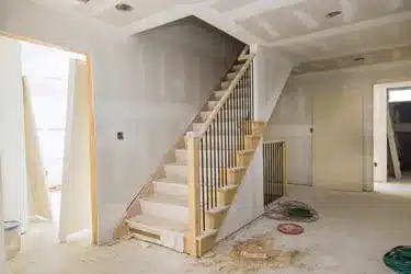 East Providence home under renovation with stairs installation in progress