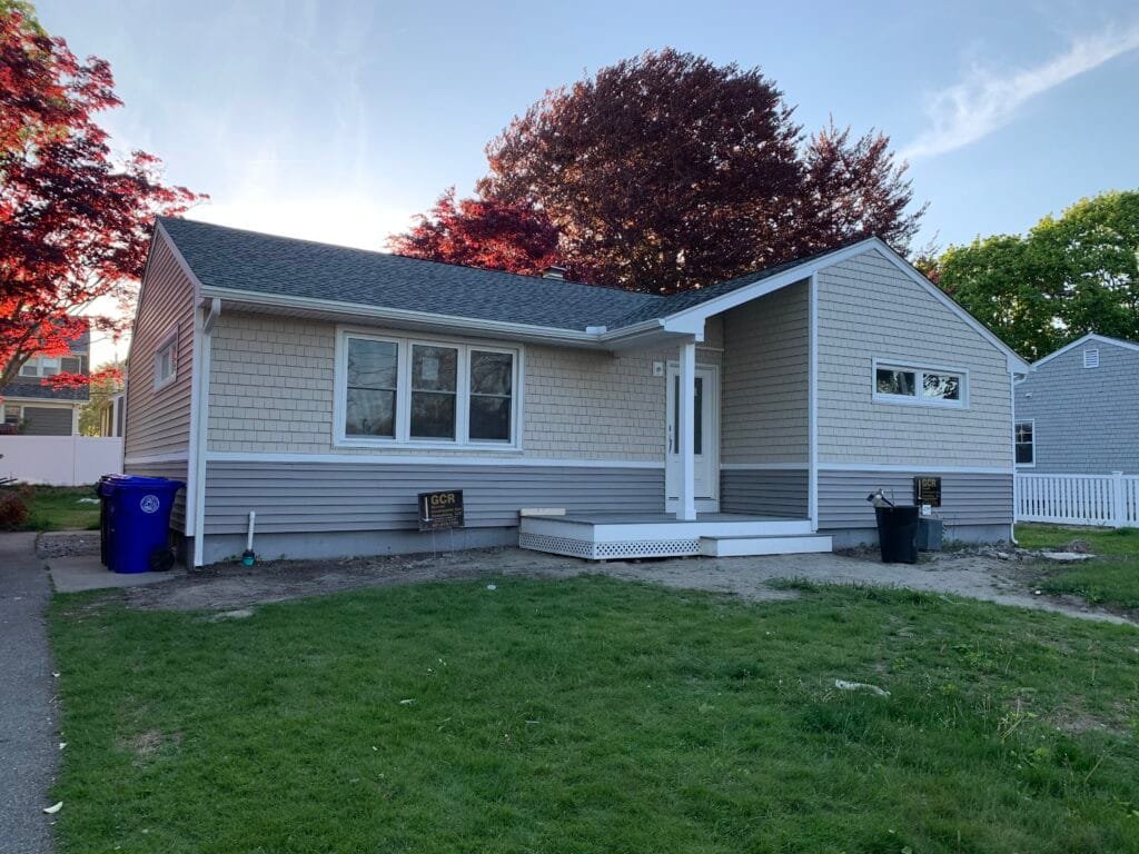 Finished siding replacement on a Rhode Island ranch home.